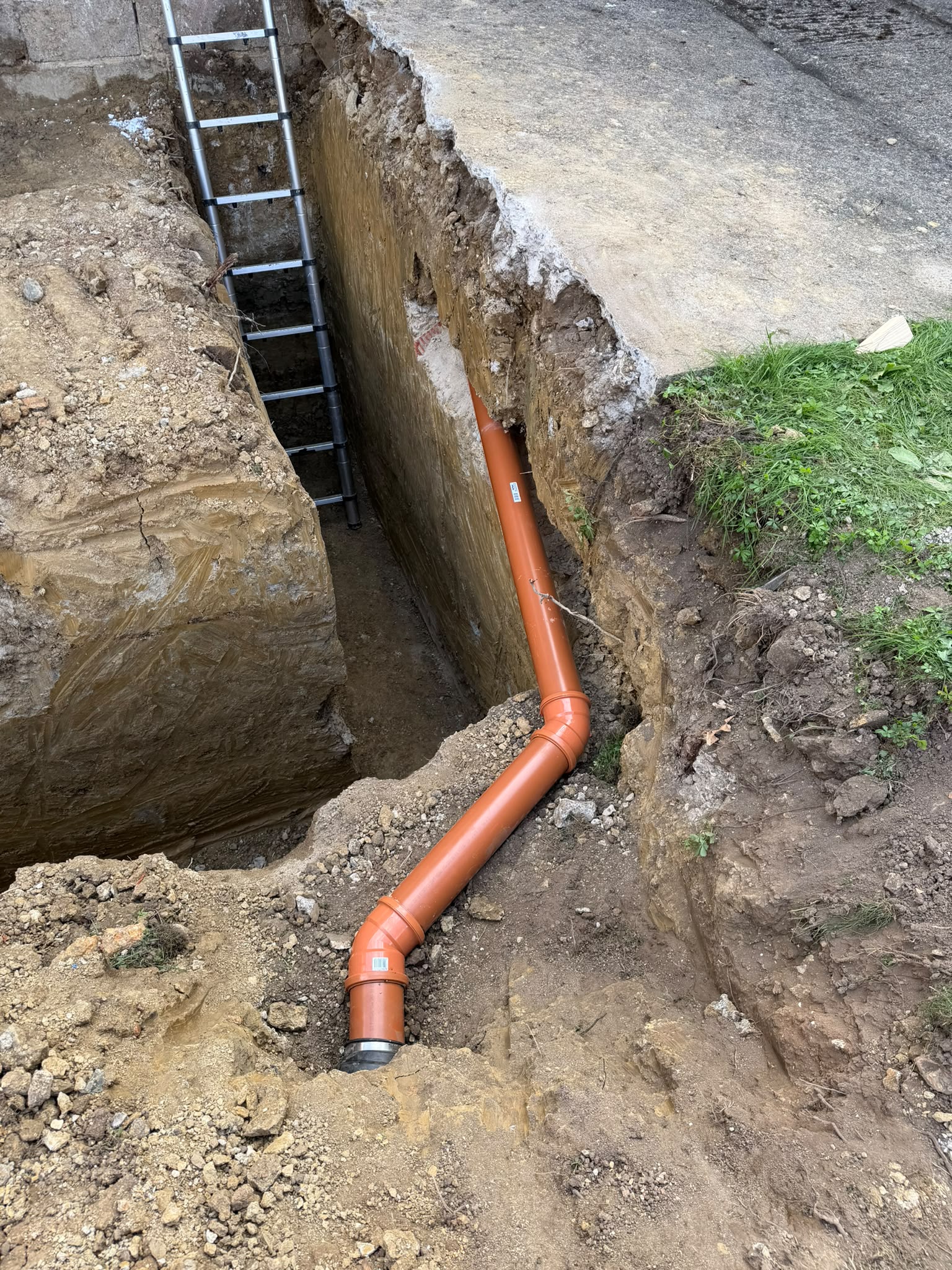 Drainage pipework installed during groundworks in Reigate