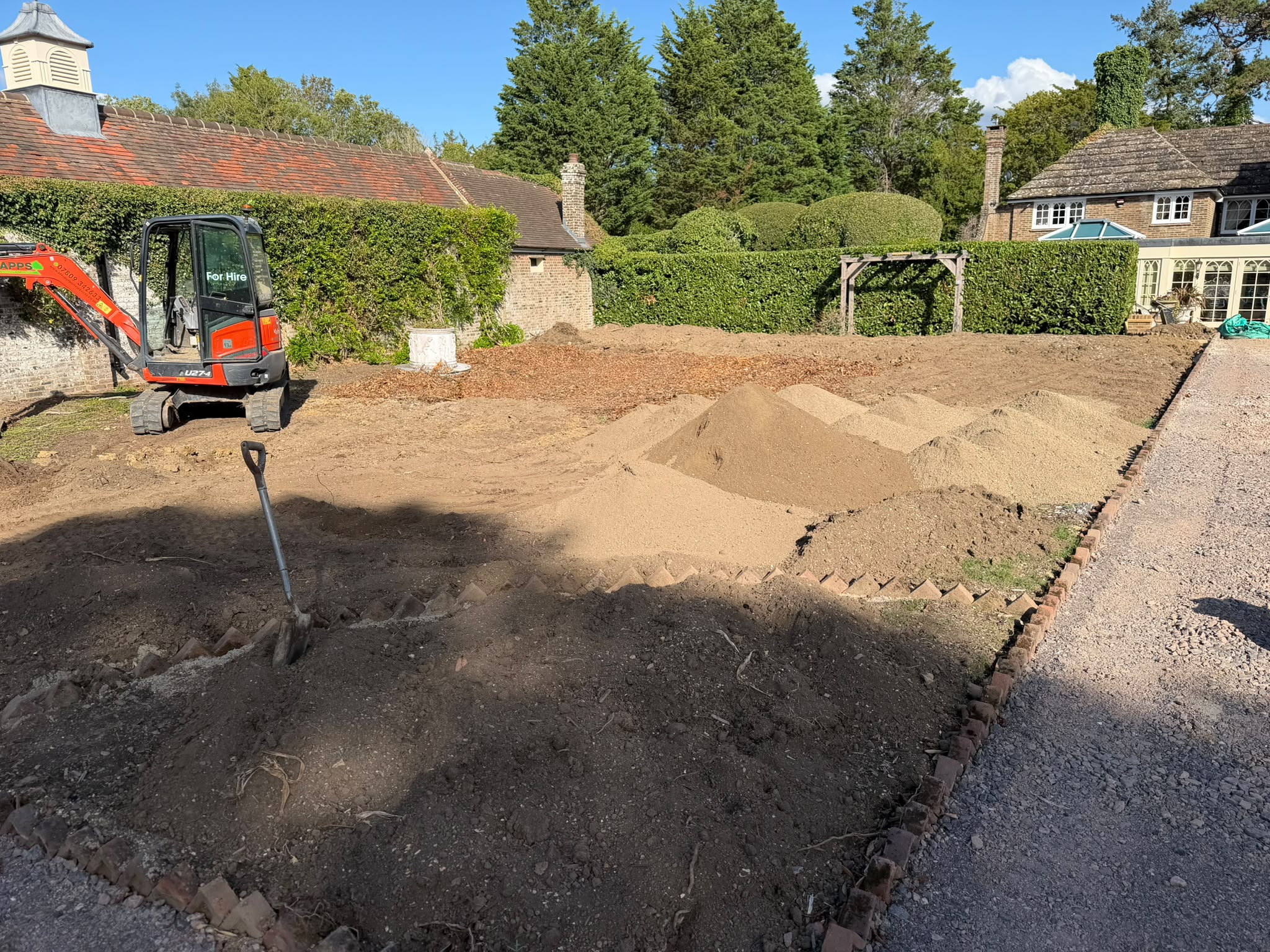 Garden before ground preparation and levelling work in Horley