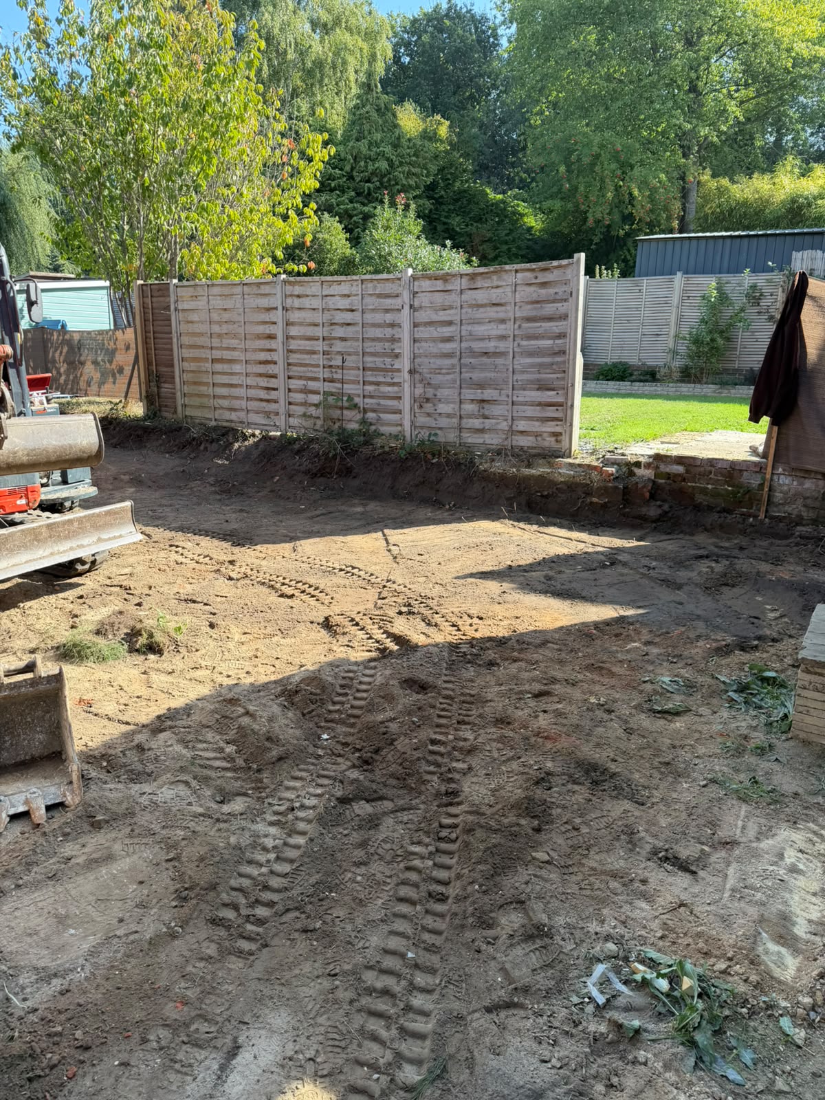 Ground preparation in a residential garden in Redhill
