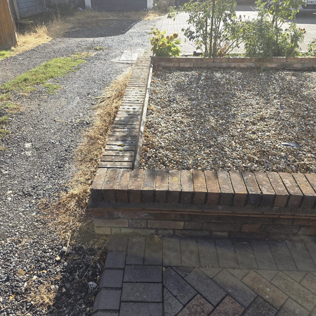 Low wall and front garden before removal in Horley
