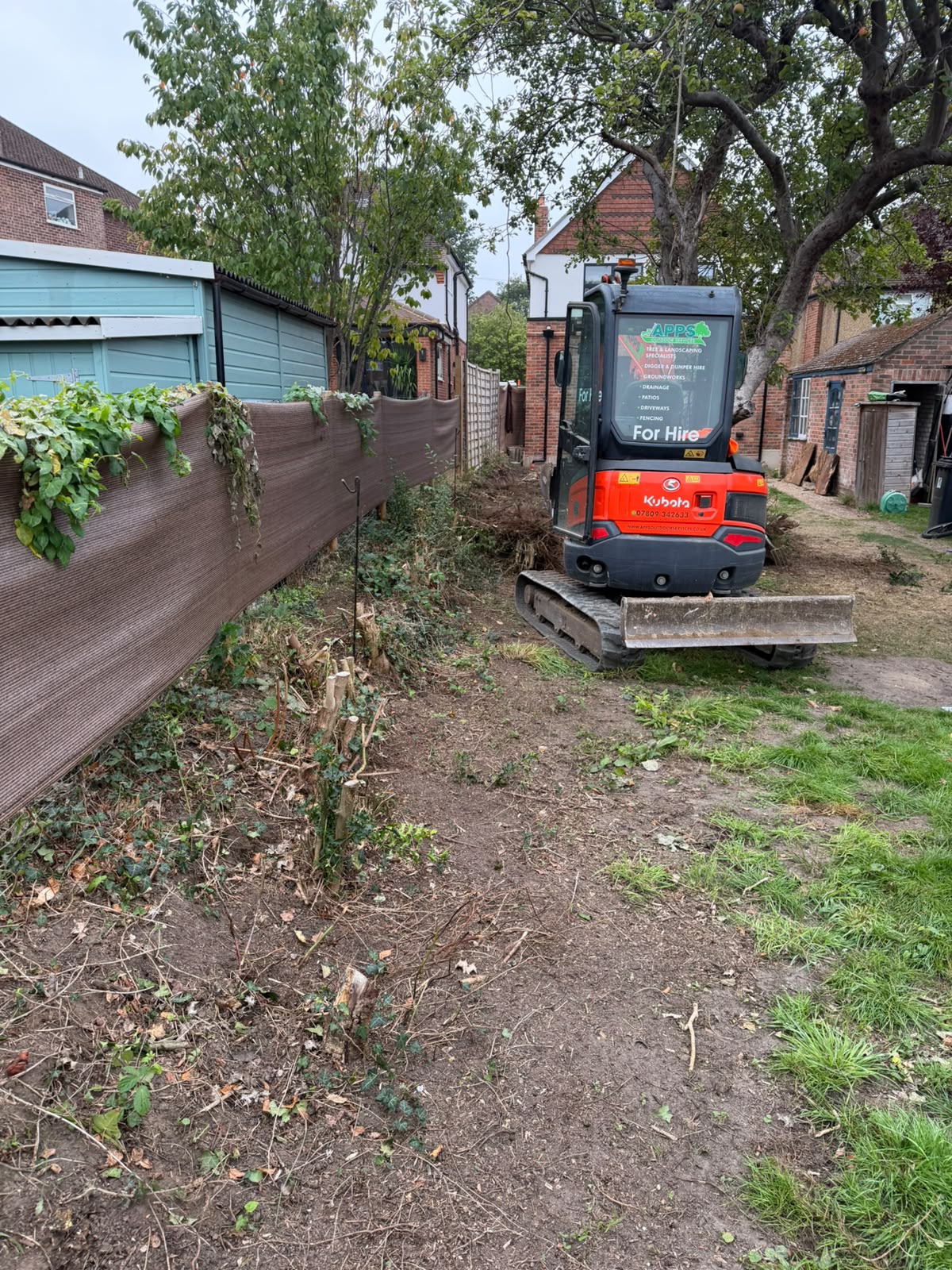 Apps Outdoor Services mini digger undertaking groundworks in Redhill